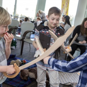 Neurin, Iestyn and Ethan sword fighting